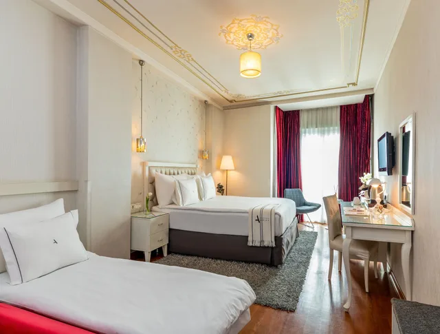 غرفة ديلوكس ثلاثية بغرفة نوم واحدة، Hotel Amira Istanbul 3/8