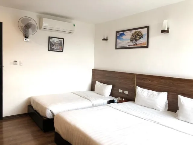 غرفة ديلوكس عائلية بسرير كوين وسرير فردي، A25 Hotel - 15 Hang Than 3/9