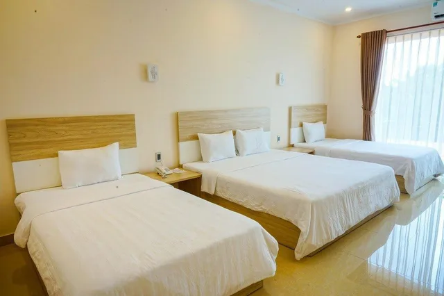 غرفة عائلية بإطلالة على الحديقة، Hon Co Resort - Ca Na 2/2