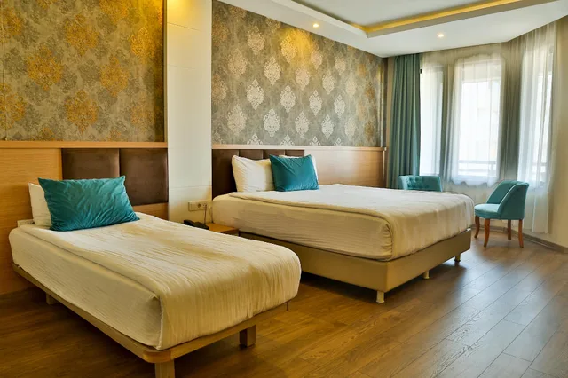 غرفة سوبيريور بسرير مزدوج وسرير فردي مع أريكة، Start Otel 1/1