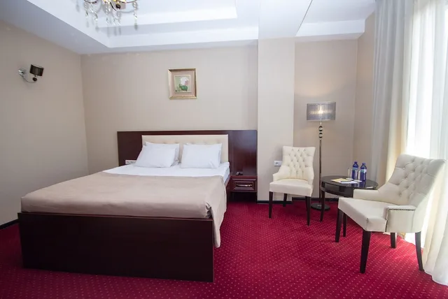 غرفة قياسية بسرير كوين بشرفة، Marionn Hotel 1/8