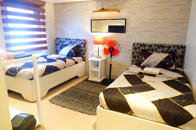 غرفة ديلوكس بسريرين منفصلين، OYO 492 Sunset View Ridge Residences 8/10