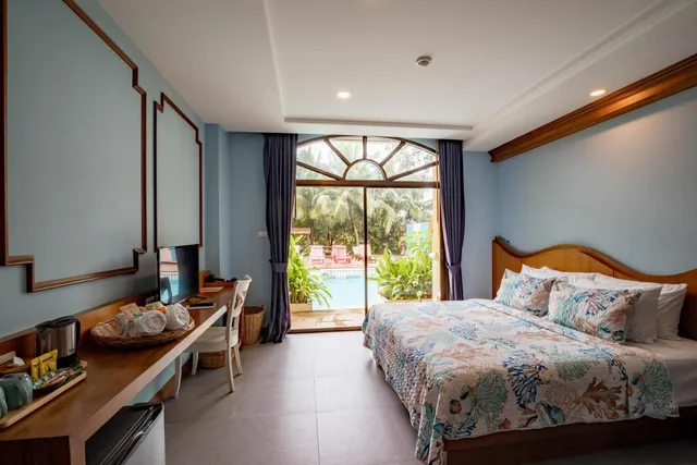 Premier, Pool Access, ROYAL PINEAPPLE HOTEL a welcome to wealth and good fortune 2/3