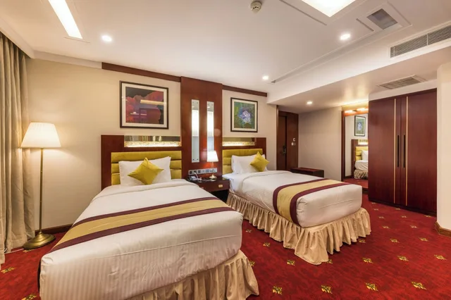 غرفة ديلوكس بسرير كينج وسريرين منفصلين، Grand Palace Hotel & Resorts Dhaka 2/4