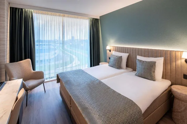 غرفة ديلوكس بسريرين منفصلين، OZO Hotels De President Amsterdam Schiphol Airport 1/11