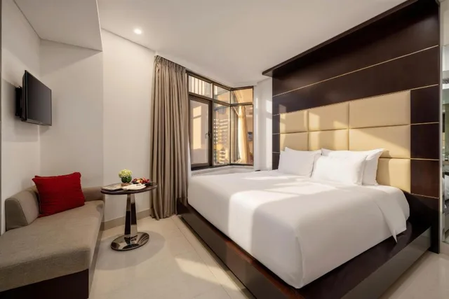 غرفة سوبيريور بسرير كينج بإطلالة على المدينة، Holiday Beach Hotel Danang 1/4